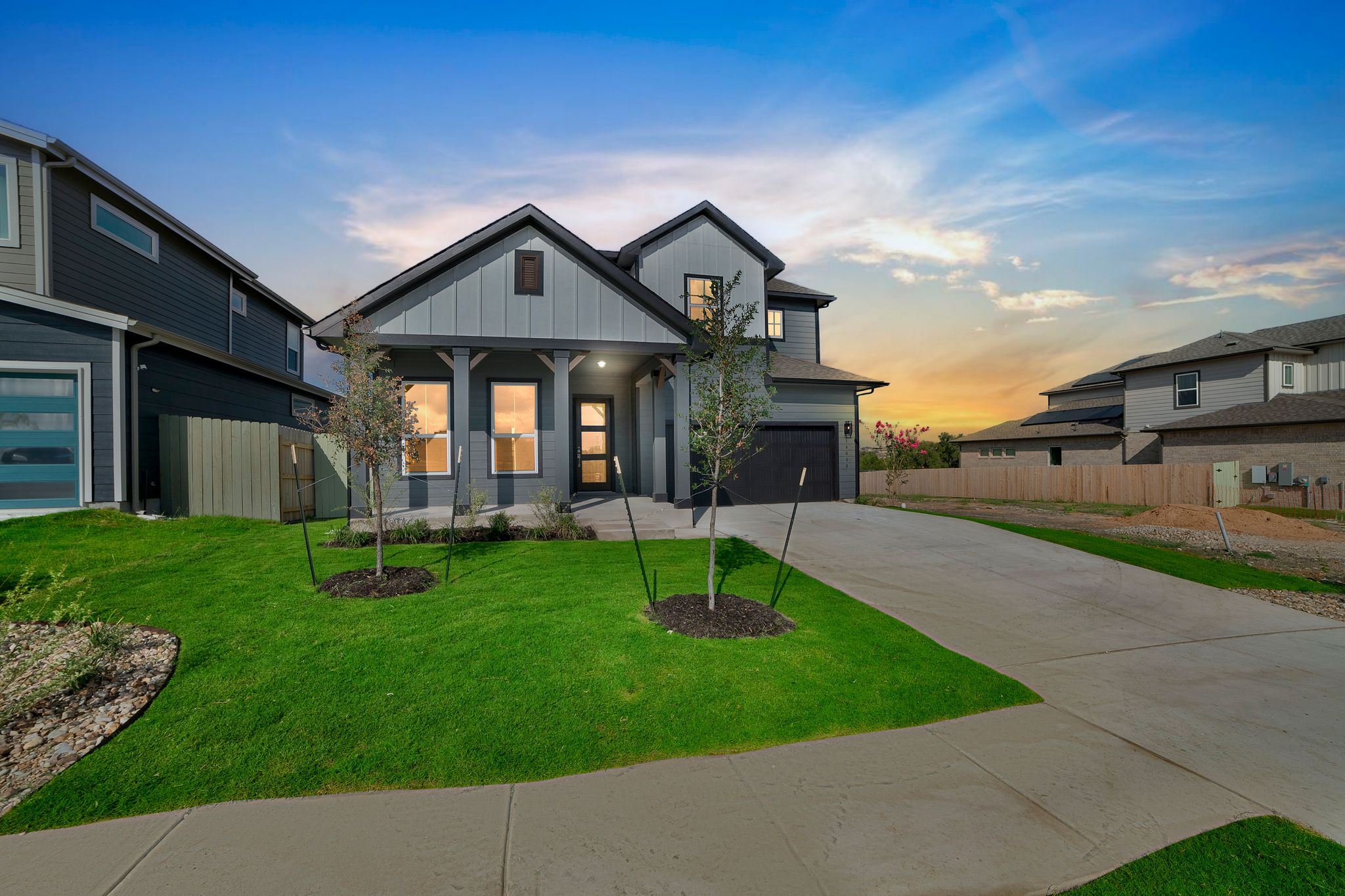 dusk photo of residential property in suburbs