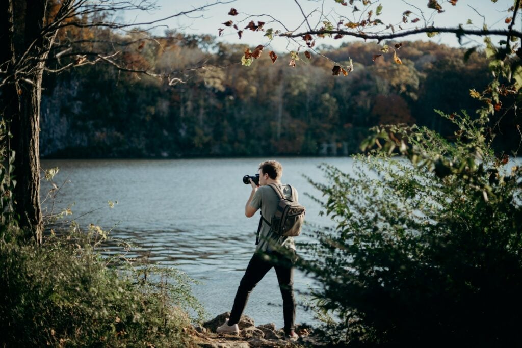 photographer near a lake