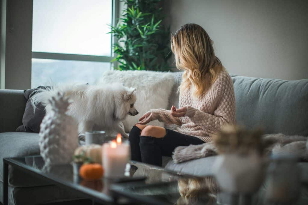 woman and white dog