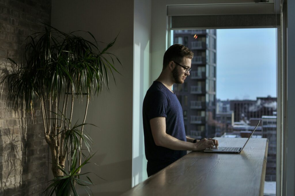 man working in apartment