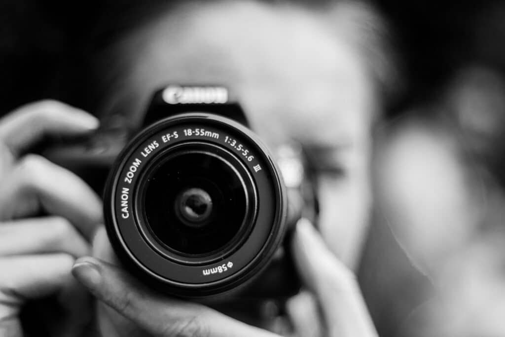 girl with Cannon camera