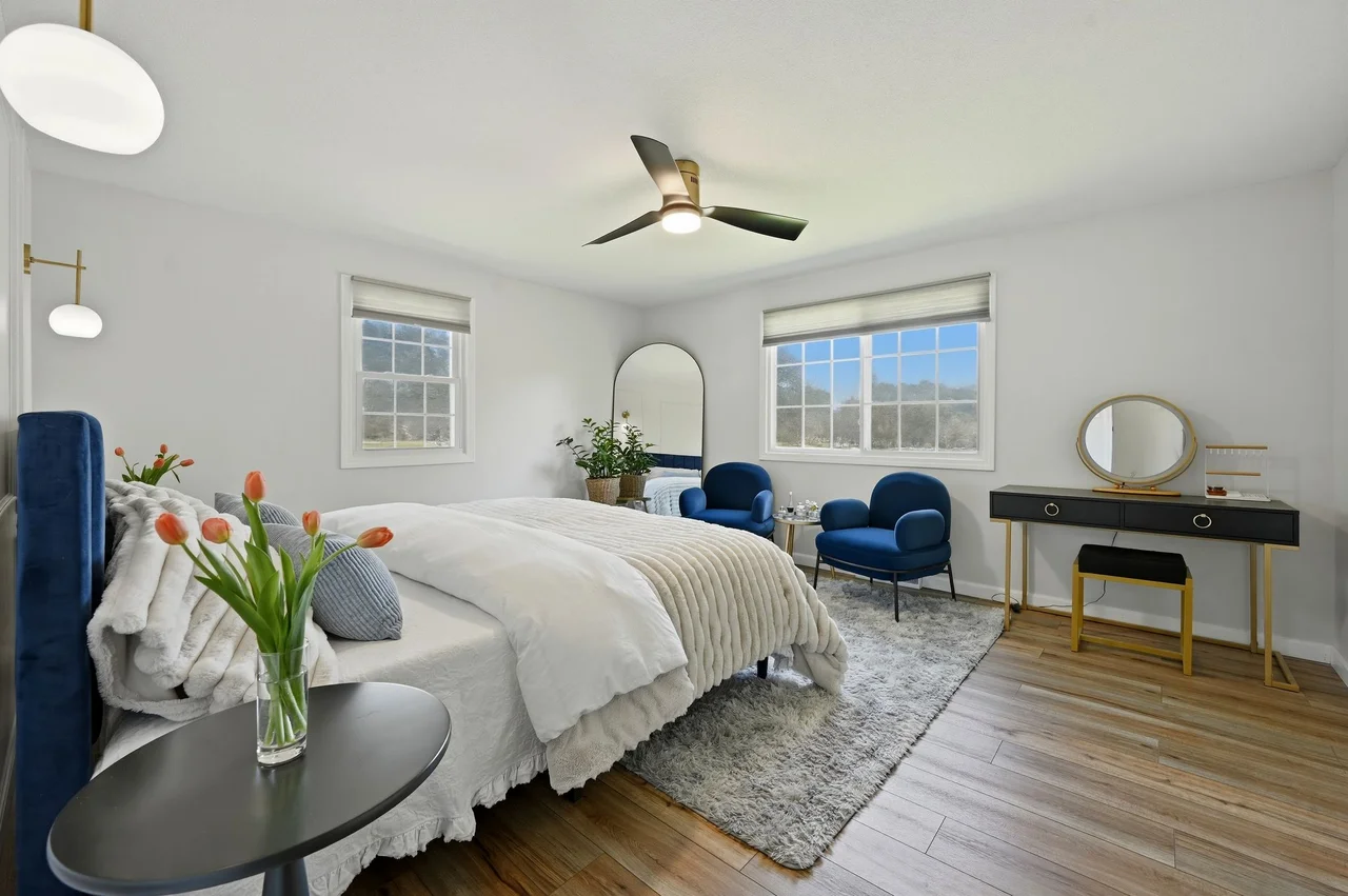 Professional real estate photographer at work capturing a property listing