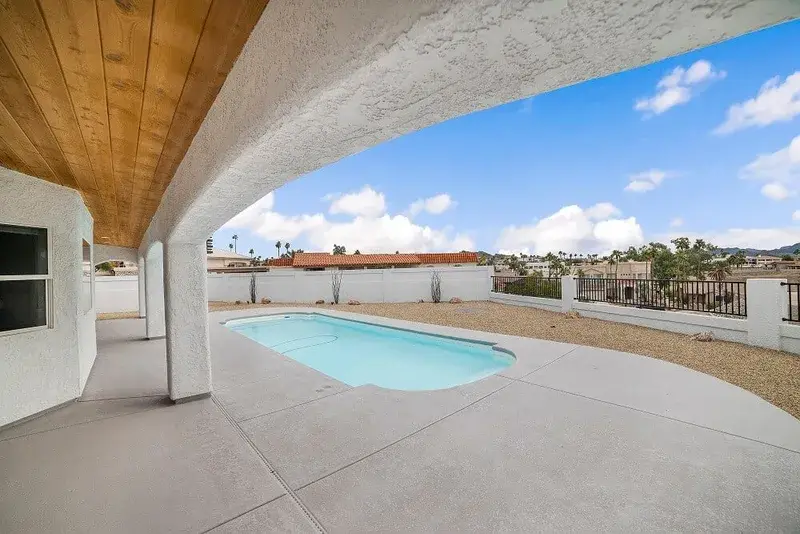 Pool area lighting enhancement before and after - Before