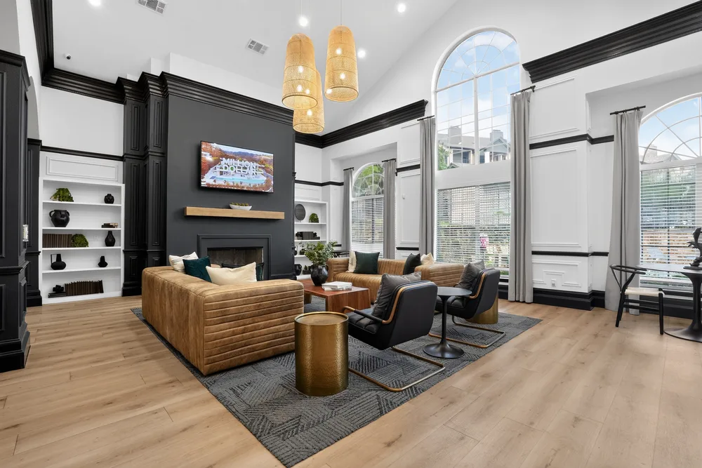 Professionally staged living room with a fireplace, prepared ahead of a listing photo shoot