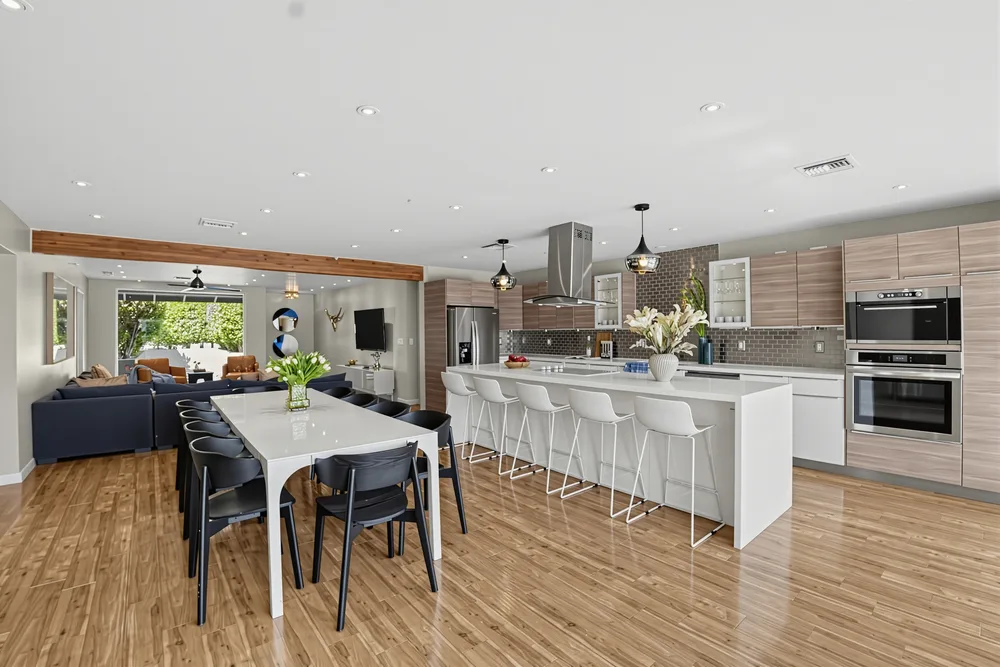 Open-concept kitchen and dining area staged and ready for professional real estate photography
