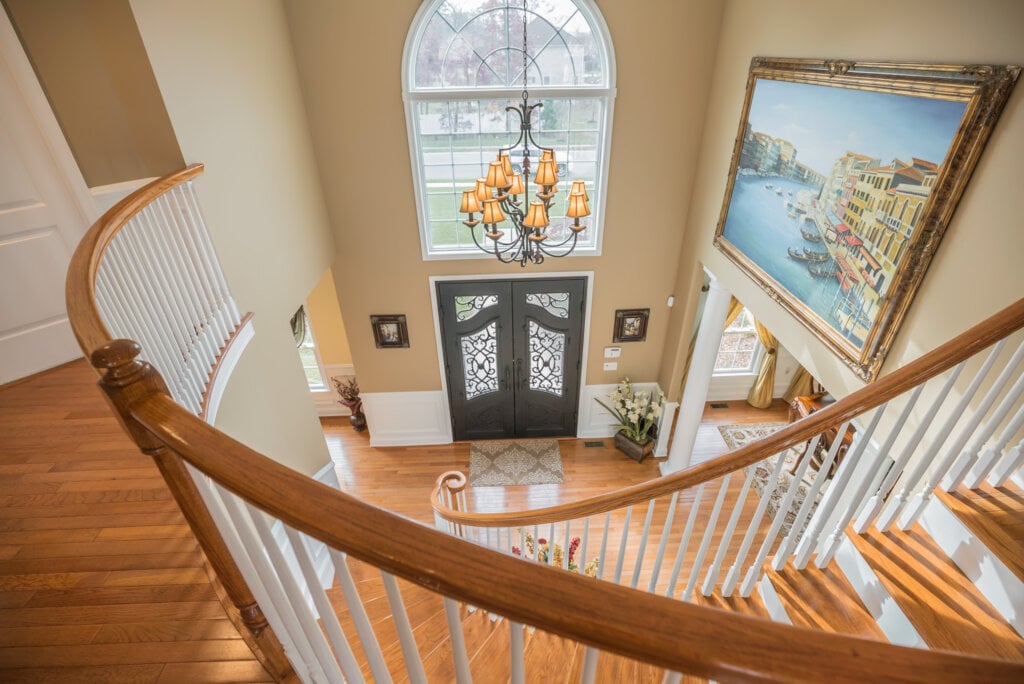 Image from top the foyer, with wood floor and stairs. Located in Jackson, NJ. Listing Agent: Estee Klein