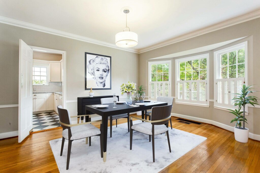 Open dining room area with modern furniture, windows and wooden floor. - HomeJab