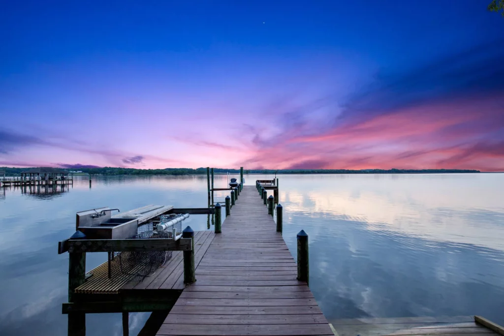 Picture of a long fishing dock taken using virtual twilight photography.